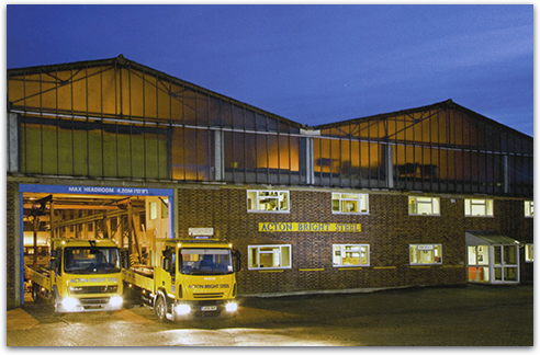 Close up
of the ends metal cylinders stacked on-top of one-another in a
warehouse